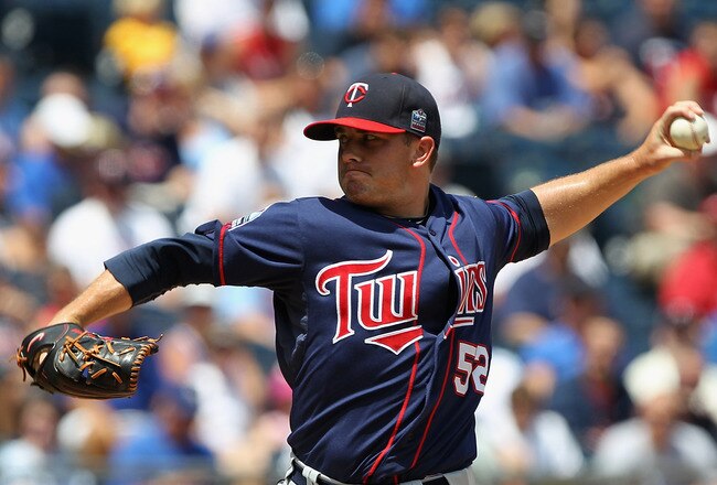 KANSAS CITY, MO - JULY 28:  Starting pitcher Brian Duensing #52 of the Minnesota Twins pitches during the game against the Kansas City Royals on July 28, 2010 at Kauffman Stadium in Kansas City, Missouri.  (Photo by Jamie Squire/Getty Images)
