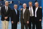 MELBOURNE, AUSTRALIA - FEBRUARY 01:  Rod Laver (C) poses with (L-R) Andres Gimeno, Ken Rosewall, John Newcombe and Tony Roche on Rod Laver Arena during day fourteen of the 2009 Australian Open at Melbourne Park on  February 1, 2009 in Melbourne, Australia. Laver beat Gimeno, Rosewall,  Newcombe and Roche respectively in the finals of the Australian Open, the French Open, Wimbledon and the US Open in 1969 to complete his second grand slam.  (Photo by Mark Dadswell/Getty Images)