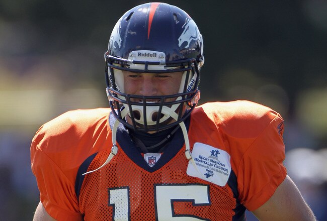 ENGLEWOOD, CO - AUGUST 18:  Rookie quarterback Tim Tebow #15 of the Denver Broncos leaves the field and heads for the locker room during the early sessions of practice at Dove Valley on August 18, 2010 in Englewood, Colorado.  (Photo by Doug Pensinger/Getty Images)