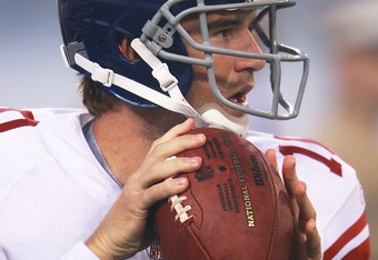 EAST RUTHERFORD, NJ - AUGUST 16:  Eli Manning #10 of the New York Giants warms up before a preseason game against the New York Jets at New Meadowlands Stadium on August 16, 2010 in East Rutherford, New Jersey. The Giants won 31 - 16. (Photo by Andrew Burton/Getty Images)