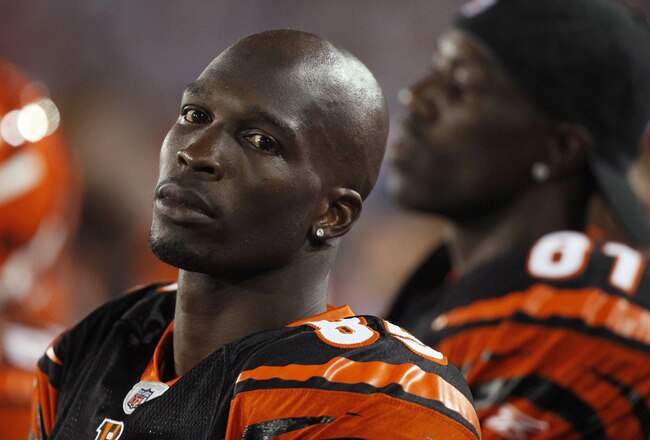 CANTON, OH - AUGUST 8: Chad Ochocinco #85 and Terrell Owens #81 of the Cincinnati Bengals look on against the Dallas Cowboys during the 2010 Pro Football Hall of Fame Game at the Pro Football Hall of Fame Field at Fawcett Stadium on August 8, 2010 in Canton, Ohio. (Photo by Joe Robbins/Getty Images)