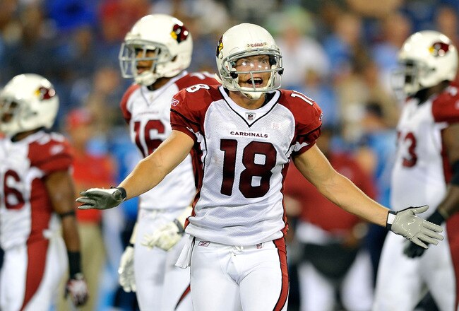 NASHVILLE, TN - AUGUST 23:  Max Komar #18 of the Arizona Cardinals attempts to explain to the sidelines that he wasn't really holding after being called for the penalty during a preseason game against the Tennessee Titans at LP Field on August 23, 2010 in Nashville, Tennessee. Tennessee defeated Arizona, 24-10.  (Photo by Grant Halverson/Getty Images)