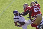 SAN FRANCISCO - AUGUST 22:  Brett Favre #4 of the Minnesota Vikings is sacked by Patrick Willis #52 and Takeo Spikes #51 of the San Francisco 49ers during an NFL pre-season game at Candlestick Park on August 22, 2010 in San Francisco, California.  (Photo by Jed Jacobsohn/Getty Images)