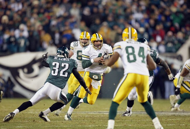 PHILADELPHIA - JANUARY 11:  Quarterback Brett Favre #4 of the Green Bay Packers scrambles during the game against the Philadelphia Eagles in the NFC divisional playoffs on January 11, 2004 at Lincoln Financial Field in Philadelphia, Pennsylvania.   The Eagles defeated the Packers 20-17 in overtime to advance to the NFC Championship game.  (Photo by Andy Lyons/Getty Images)