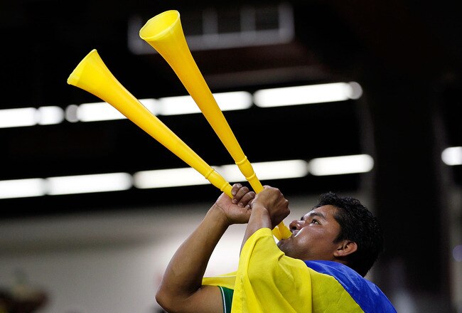 ATLANTA - JULY 28:  A fan of Club America plays two vuvuzelas during the match against Manchester City during the 2010 Aaron's International Soccer Challenge match at Georgia Dome on July 28, 2010 in Atlanta, Georgia.  (Photo by Kevin C. Cox/Getty Images)