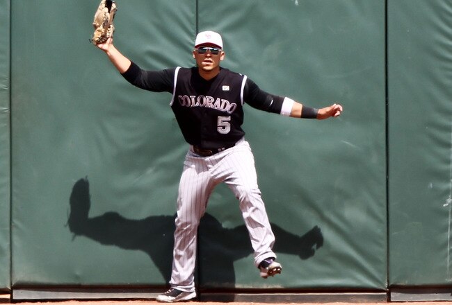 SAN FRANCISCO - MAY 31: Carlos Gonzalez #5 of the Colorado Rockies catches a ball hit by Bengie Molina of the San Francisco Giants in the eighth inning during an MLB game at AT&T Park on May 31, 2010 in San Francisco, California.  (Photo by Jed Jacobsohn/Getty Images)
