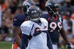ENGLEWOOD, CO - AUGUST 05:  Running back LenDale White #26 of the Denver Bronocs takes part in practice during training camp at Dove Valley on August 5, 2010 in Englewood, Colorado.  (Photo by Doug Pensinger/Getty Images)