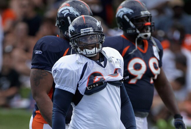 ENGLEWOOD, CO - AUGUST 05:  Running back LenDale White #26 of the Denver Bronocs takes part in practice during training camp at Dove Valley on August 5, 2010 in Englewood, Colorado.  (Photo by Doug Pensinger/Getty Images)