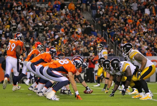 DENVER - NOVEMBER 09:  The Denver Broncos offense takes the line of scrimmage against the Pittsburgh Steelers defense on during NFL action at Invesco Field at Mile High on November 9, 2009 in Denver, Colorado. The Steelers defeated the Broncos 28-10.  (Photo by Doug Pensinger/Getty Images)