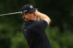 MUNICH, GERMANY - JUNE 24:  Ernie Els of South Africa plays his second shot on the 11th hole during the first round of The BMW International Open at The Munich North Eichenried Golf Club on June 24, 2010, in Munich, Germany.  (Photo by Warren Little/Getty Images)