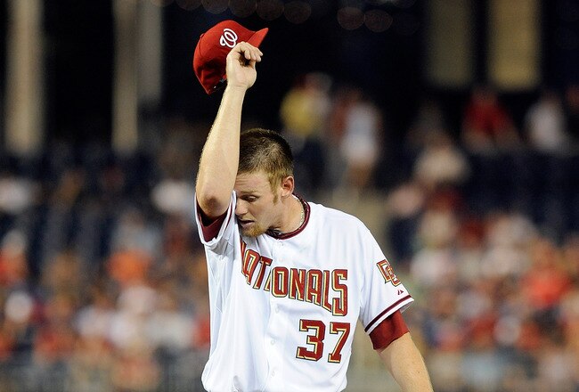 WASHINGTON - AUGUST 10:  Stephen Strasburg #37 of the Washington Nationals wipes his forehead during the game against the Florida Marlins at Nationals Park on August 10, 2010 in Washington, DC.  (Photo by Greg Fiume/Getty Images)