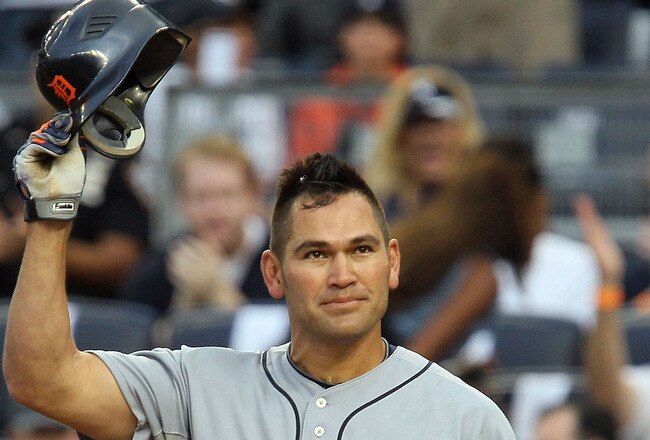 NEW YORK - AUGUST 16:  Johnny Damon #18 of the Detroit Tigers salutes the crowd prior to his first at bat against the New York Yankees on August 16, 2010 at Yankee Stadium in the Bronx borough of New York City.  (Photo by Jim McIsaac/Getty Images)