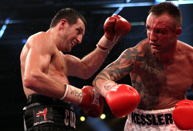 HERNING, DENMARK - APRIL 24:  Mikkel Kessler of Denmark (R) lands a right cross on Carl Froch of England during their Super Six WBC Super Middleweight title fight on April 24, 2010 at MCH  Messecenter Arena in Herning, Denmark.  (Photo by John Gichigi/Getty Images)