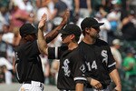 CHICAGO - AUGUST 01: Brent Lillibridge #18 of the Chicago White Sox celerates with teammates Juan Pierre #1 and Paul Konerko #14 after a win against the Oakland Athletics at U.S. Cellular Field on August 1, 2010 in Chicago, Illinois. The White Sox defeated the Athletics 4-1. (Photo by Jonathan Daniel/Getty Images)