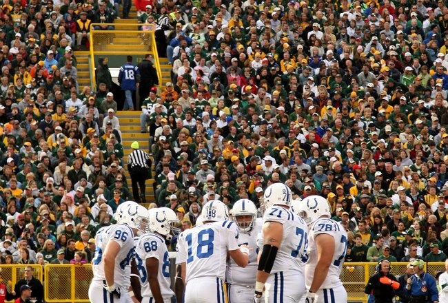 GREEN BAY, WI - OCTOBER 19:  The Indianapolis Colts  offense huddles during the game with the Green Bay Packers on October 19, 2008 at Lambeau Field in Green Bay Wisconsin. The Packers won 34-14.   (Photo by Stephen Dunn/Getty Images)