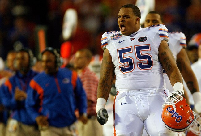 MIAMI - JANUARY 08: Mike Pouncey #55 of the Florida Gators reacts after a play against the Oklahoma Sooners in the FedEx BCS National Championship Game at Dolphin Stadium on January 8, 2009 in Miami, Florida.  (Photo by Eliot J. Schechter/Getty Images)