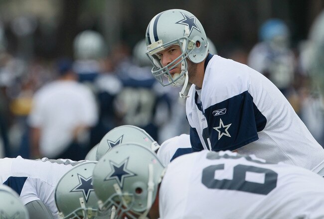 OXNARD, CA - AUGUST 14:  Quarterback Tony Romo #9 looks over at his receivers during Dallas Cowboys Training Camp at the Marriott Residence Inn Oxnard River Ridge on August 14, 2010 in Oxnard, California.  (Photo by Jeff Gross/Getty Images)