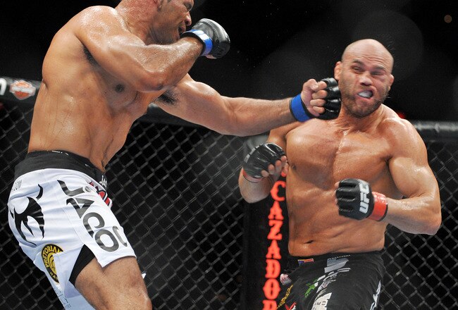 PORTLAND, OR - AUGUST 29:  UFC fighter Antonio Nogueira (L) battles UFC fighter Randy Couture (R) during their Heavyweight bout at UFC 102:  Couture vs. Nogueira at the Rose Garden Arena on August 29, 2009 in Portland, Oregon.  (Photo by Jon Kopaloff/Getty Images)
