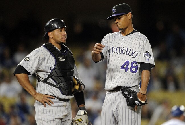 LOS ANGELES, CA - MAY 07:  Esmil Rogers #48 and Miguel Olivo #21 of the Colorado Rockies reacts after allowing three runs to the Los Angeles Dodgers during the fifth inning at Dodger Stadium on May 7, 2010 in Los Angeles, California.  (Photo by Harry How/Getty Images)