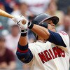 CLEVELAND - JUNE 13:  Shin-Soo Choo #17 of the Cleveland Indians hits an RBI double against the Washington Nationals during the game on June 13, 2010 at Progressive Field in Cleveland, Ohio.  (Photo by Jared Wickerham/Getty Images)