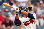CLEVELAND - JUNE 13:  Shin-Soo Choo #17 of the Cleveland Indians hits an RBI double against the Washington Nationals during the game on June 13, 2010 at Progressive Field in Cleveland, Ohio.  (Photo by Jared Wickerham/Getty Images)
