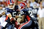 LANDOVER, MD - AUGUST 13:  Trent Edwards #5 of the Buffalo Bills hands the ball off to C.J. Spiller #21 during the preseason game against the Washington Redskins at FedEx Field on August 13, 2010 in Landover, Maryland.  (Photo by Greg Fiume/Getty Images)