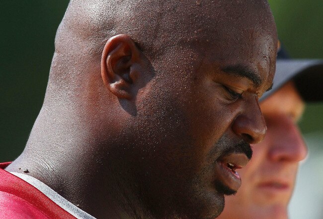 ASHBURN, VA - AUGUST 06:  Defensive lineman Albert Haynesworth #92 of the Washington Redskins walks off the field after missing his eighth consecutive day of practice during Redskins training camp on August 6, 2010 in Ashburn, Virginia.  (Photo by Win McNamee/Getty Images)