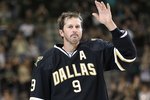 DALLAS - APRIL 08:  Center Mike Modano #9 of the Dallas Stars waves to the crowd after his last home game of the season against the Anaheim Ducks at American Airlines Center on April 8, 2010 in Dallas, Texas.  (Photo by Ronald Martinez/Getty Images)