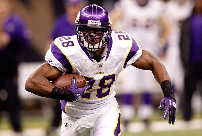 NEW ORLEANS - JANUARY 24:  Adrian Peterson #28 of the Minnesota Vikings runs the ball against the New Orleans Saints during the NFC Championship Game at the Louisana Superdome on January 24, 2010 in New Orleans, Louisiana.  (Photo by Chris Graythen/Getty Images)