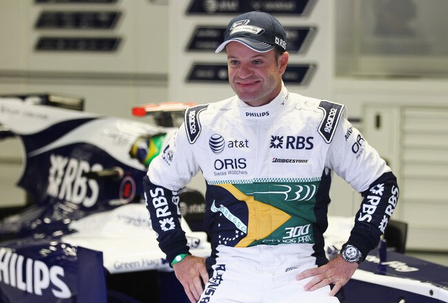 SPA FRANCORCHAMPS, BELGIUM - AUGUST 27:  Rubens Barrichello of Brazil and Williams appears with specially designed overalls and helmet to commerorate his 300th Grand Prix before practice for the Belgian Formula One Grand Prix at the Circuit of Spa Francorchamps on August 27, 2010 in Spa Francorchamps, Belgium.  (Photo by Paul Gilham/Getty Images)