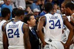 NEW ORLEANS - MARCH 20:  Head coach John Calipari  of the Kentucky Wildcats talks with his team during the second round of the 2010 NCAA men's basketball tournament at the New Orleans Arena on March 20, 2010 in New Orleans, Louisiana.  (Photo by Chris Graythen/Getty Images)