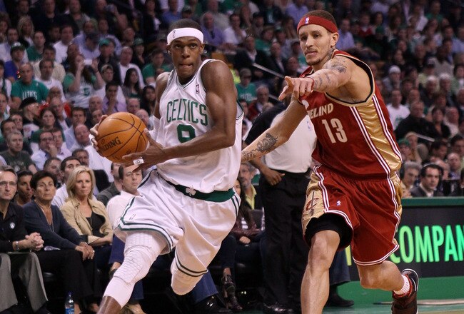 BOSTON - MAY 13:  Rajon Rondo #9 of the Boston Celtics drives to the net as Delonte West #13 of the Cleveland Cavaliers defends during Game Six of the Eastern Conference Semifinals of the 2010 NBA playoffs at TD Garden on May 13, 2010 in Boston, Massachusetts.  NOTE TO USER: User Expressly Acknowledges and agrees that, by downloading and or using this photograph, User is consenting to the terms and conditions of the Getty Images License Agreement.  (Photo by Elsa/Getty Images)