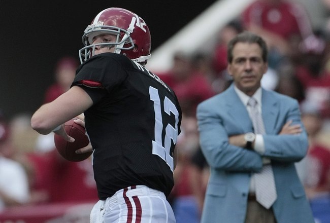 TUSCALOOSA, AL - APRIL 17:  Coach Nick Saban of the Alabama Crimson Tide watches quarterback Greg McElroy #12 throw during the Alabama spring game at Bryant Denny Stadium on April 17, 2010 in Tuscaloosa, Alabama. (Photo by Dave Martin/Getty Images)