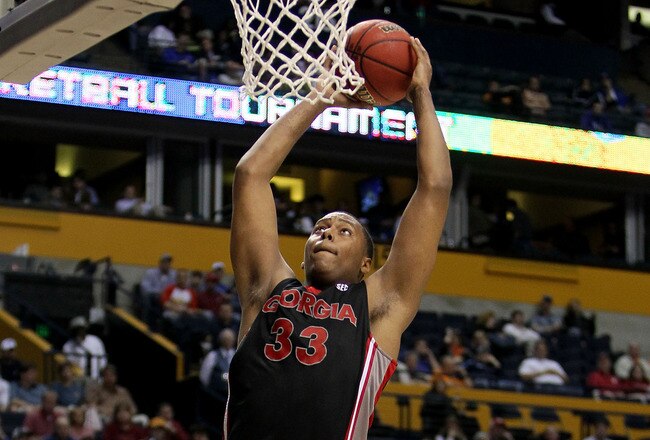 NASHVILLE, TN - MARCH 11:  Trey Thompkins #33 of the Georgia Bulldogs goes up for a dunk attempt against the Arkanasas Razorbacks during the first round of the SEC Men's Basketball Tournament at the Bridgestone Arena on March 11, 2010 in Nashville, Tennessee.  (Photo by Andy Lyons/Getty Images)