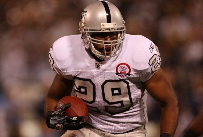OAKLAND, CA - SEPTEMBER 14:  Michael Bush #29 of the Oakland Raiders runs for a four yard touchdown in the first quarter against the San Diego Chargers on September 14, 2009 at the Oakland-Alameda County Coliseum in Oakland, California.  (Photo by Ezra Shaw/Getty Images)