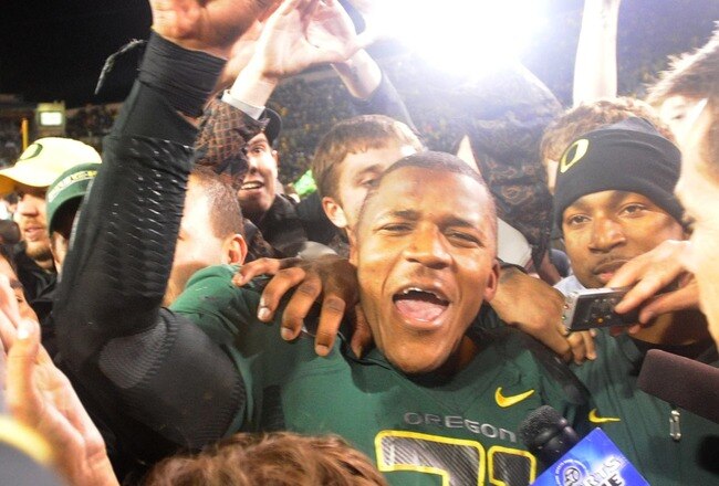 EUGENE, OR - OCTOBER 31: Running back LaMichael James #11 of the Oregon Ducks celebrates with fans after the game against the USC Trojans at Autzen Stadium on October 31, 2009 in Eugene, Oregon. James ran for 183 yards and a score as the Ducks won the game 47-20. (Photo by Steve Dykes/Getty Images)