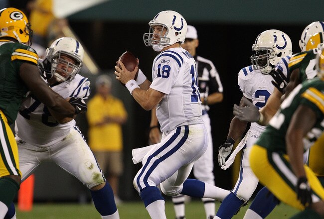 GREEN BAY, WI - AUGUST 26: Peyton Manning #18 of the Indianapolis Colts drops back to pass against the Green Bay Packers during a preseason game at Lambeau Field on August 26, 2010 in Green Bay, Wisconsin.  The Packers defeated the Colts 59-24.  (Photo by Jonathan Daniel/Getty Images)