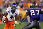 GLENDALE, AZ - JANUARY 04:  Titus Young #4 of the Boise State Broncos runs after a catch against Jason Teague #27 of the TCU Horned Frogs during the Tostitos Fiesta Bowl at the Universtity of Phoenix Stadium on January 4, 2010 in Glendale, Arizona.  (Photo by Christian Petersen/Getty Images)