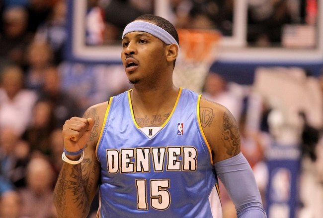 SALT LAKE CITY - APRIL 30:  Carmelo Anthony #15 of the Denver Nuggets pumps his fist during their game against the Utah Jazz in Game Six of the Western Conference Quarterfinals of the 2010 NBA Playoffs at EnergySolutions Arena on April 30, 2010 in Salt Lake City, Utah. NOTE TO USER: User expressly acknowledges and agrees that, by downloading and or using this photograph, User is consenting to the terms and conditions of the Getty Images License Agreement.  (Photo by Ezra Shaw/Getty Images)