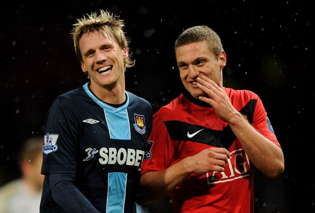 MANCHESTER, ENGLAND - FEBRUARY 23: Nemanja Vidic of Manchester United shares a joke with Radoslav Kovac of West Ham after the Barclays Premier League match between Manchester United and West Ham United at Old Trafford on February 23, 2010 in Manchester, England.  (Photo by Michael Regan/Getty Images)