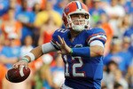 GAINESVILLE, FL - NOVEMBER 21: Quarterback John Brantley #12 of the Florida Gators sets to pass against the Florida International University Golden Panthers, November 21, 2009 at Ben Hill Griffin Stadium in Gainesville, Florida.  (Photo by Al Messerschmidt/Getty Images)