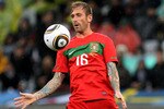 CAPE TOWN, SOUTH AFRICA - JUNE 21:  Raul Meireles of Portugal controls the ball during the 2010 FIFA World Cup South Africa Group G match between Portugal and North Korea at the Green Point Stadium on June 21, 2010 in Cape Town, South Africa.  (Photo by Doug Pensinger/Getty Images)