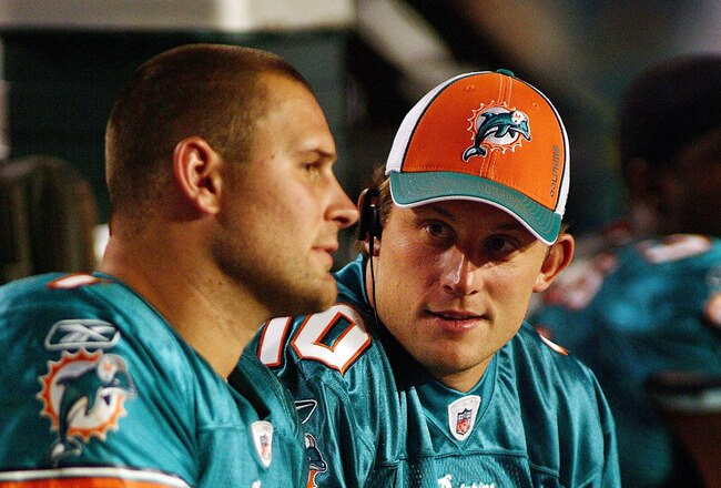MIAMI - AUGUST 09:  Quarterback Chad Pennington #10 of the Miami Dolphins sits with quarterback Chad Henne #7 during a pre season game against the Tampa Bay Buccaneers August 9, 2008 at Dolphin Stadium in Miami, Florida.  (Photo by Marc Serota/Getty Images)