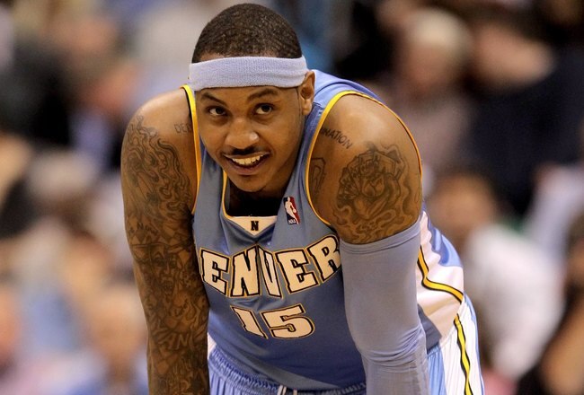 SALT LAKE CITY - APRIL 30:  Carmelo Anthony #15 of the Denver Nuggets stands on the court during their game against the Utah Jazz in Game Six of the Western Conference Quarterfinals of the 2010 NBA Playoffs at EnergySolutions Arena on April 30, 2010 in Salt Lake City, Utah. NOTE TO USER: User expressly acknowledges and agrees that, by downloading and or using this photograph, User is consenting to the terms and conditions of the Getty Images License Agreement.  (Photo by Ezra Shaw/Getty Images)