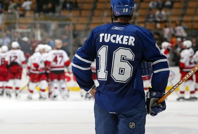 TORONTO - OCTOBER 9:  Darcy Tucker #16 of the Toronto Maple Leafs watches as the Carolina Hurricanes celebrate their 7-1 victory during their NHL game at the Air Canada Centre October 9, 2007 in Toronto, Ontario.  (Photo By Dave Sandford/Getty Images)