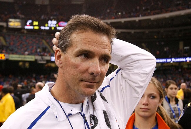 NEW ORLEANS - JANUARY 01:  Head coach Urban Meyer of the Florida Gators celebrates after defeating the Cincinnati Bearcats 24-51 during the Allstate Sugar Bowl at the Louisana Superdome on January 1, 2010 in New Orleans, Louisiana.  (Photo by Kevin C. Cox/Getty Images)