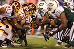 EAST RUTHERFORD, NJ - AUGUST 27:  The New York Jets and the Washington Redskins move after the snap of the ball during their preseason game on August 27, 2010 at the New Meadowlands Stadium  in East Rutherford, New Jersey.  (Photo by Al Bello/Getty Images)