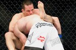 MONTREAL- MAY 8: Jonathan Goulet (front) holds onto Marcus Davis in their welterweight bout at UFC 113 at Bell Centre on May 8, 2010 in Montreal, Quebec, Canada.  (Photo by Richard Wolowicz/Getty Images)