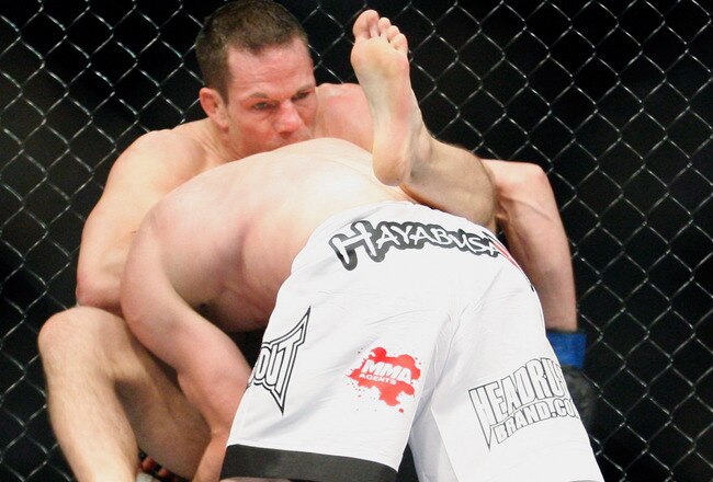 MONTREAL- MAY 8: Jonathan Goulet (front) holds onto Marcus Davis in their welterweight bout at UFC 113 at Bell Centre on May 8, 2010 in Montreal, Quebec, Canada.  (Photo by Richard Wolowicz/Getty Images)
