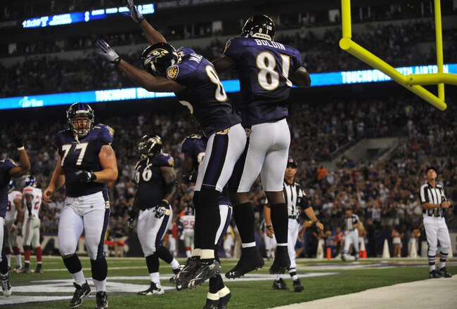 BALTIMORE - AUGUST 28:  Anquan Boldin #81 of the Baltimore Ravens celebrates a touchdown against the New York Giants at M&T Bank Stadium on August 28, 2010 in Baltimore, Maryland. The Ravens lead the Giants 17-3. (Photo by Larry French/Getty Images)